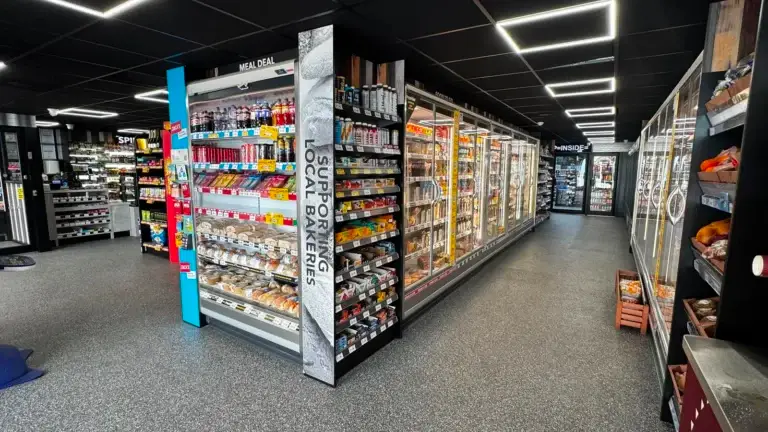 The finished Premier Aberkenfig store — meal deal and food-to-go run under the new black ceiling grid