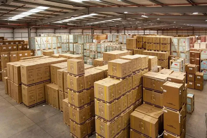 Inside the TEFCOLD warehouse — stock stacked and ready to ship
